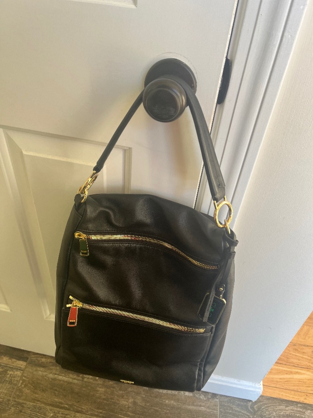 Tuni Black Leather Backback